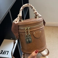 Vintage brown leather barrel bag with decorative silk scarf and dual lock zippers - Brown