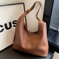 Brown lychee leather tote bag with adjustable strap and golden buckle for women - Caramel color