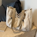 Cabas en toile beige avec sangles brunes et poches latérales à cordon pratiques - Blanc Cassé