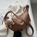 Brown lychee leather crescent saddle bag with cute plush monster pendant and gold zipper - With Charm / Khaki
