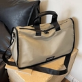 Khaki large capacity crossbody pillow bag with black straps and minimalist logo - Gray