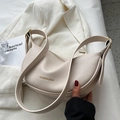 Minimalist beige crescent saddle bag in lychee pattern leather with gold lettering - No Pendant / Off White