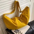 Yellow canvas crescent crossbody bag with adjustable wide strap and fringe detail - Yellow