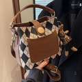 Brown leather and black-white quilted bucket bag with a cute rabbit plush charm - Brown Argyle With Pendant