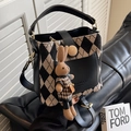 Quilted beige bucket bag with black leather trim and a cute knitted rabbit charm - Black Argyle With Pendant