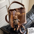 Vintage orange and blue plaid bucket bag with brown leather trim and rabbit charm - Brown Checkered With Pendant