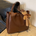 Large dark brown pebble leather bucket bag with fashion print and bear charm - Coffee With Pendant