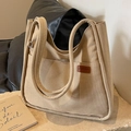 Bolso cubo grande de lona caqui con etiqueta de cuero y correas de hombro largas - Caqui