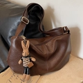 Large dark brown pleated crossbody bag with a cute knitted rabbit charm accessory - With Pendant / Brown
