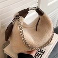 Chic beige faux shearling crescent bag with dark brown leather trim and silver chain - White