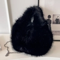 Chic black faux fur handbag with silver metal chain strap for winter fashion - Black