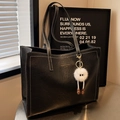 Large black vintage tote bag with contrast stitching and plush monster charm - Black