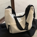 White nylon crescent crossbody bag with adjustable wide black shoulder strap and buckle - White