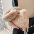 Beige faux fur bucket bag with a leather label and silver chain strap for autumn - Khaki