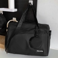 Grande borsa da viaggio in nylon nero con tracolla e piccolo astuccio rotondo - Nero