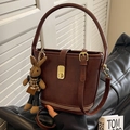 Retro dark brown crossbody bucket bag with golden twist lock and plush rabbit charm - Coffee with Pendant