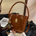Retro caramel brown bucket bag with gold lock and leopard print rabbit charm - Brown with Pendant