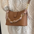 Brown lychee leather crossbody bag with silk scarf wrapped chain and top handle - Brown