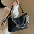 Black pebbled leather crossbody bag with gold chain strap wrapped in printed silk scarf - Black