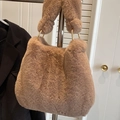 Plush faux fur shoulder bag in brown with stylish gold ring accents for winter - Coffee