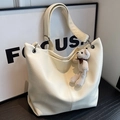 Creamy white large tote bag in textured faux leather with a woven bear charm - Off-white (With Pendant)