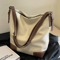 Chic cream and brown contrast stitching bucket bag with adjustable straps and PU texture - Off White