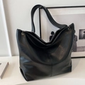 Large black leather tote bag for women featuring a minimalist design and soft texture - Black (Without Charm)