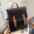 Vintage black quilted leather backpack with brown straps and plush pompom charm - L Black