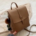 Vintage brown leather backpack with matte finish and decorative plush ball charm - Brown with Pendant
