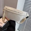 Minimalist white canvas chest bag with adjustable strap and decorative zipper pull - Off White