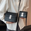 Black matte leather crossbody bag in small and mini sizes with silver metallic buckle - L Black