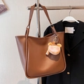 Brown large capacity PU leather tote bag with a pink plush charm on a metal stand - With Charm / Brown