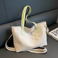 Off-white tote bag with light green handles and geometric patterned wide shoulder strap - Green