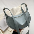 Light blue pebbled leather hobo bag with gold hardware and adjustable strap - Blue