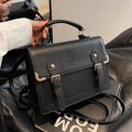 Classic black leather JK Cambridge backpack with gold hardware and top handle - Black