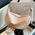 Light pink pebbled leather dumpling bag with gold zipper and adjustable shoulder strap - Pink