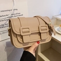 Minimalist beige crossbody bag with lychee pattern leather and double buckle detail - Khaki