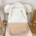 Mochila bicolor blanca y caqui con etiqueta Libano sobre una silla blanca - Blanco