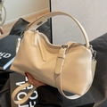 Creamy leather pillow bag with silver zippers and elegant top handle strap - Off White