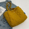Quilted ginger yellow tote bag with diamond stitching and drawstring closure - Yellow