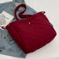 Quilted burgundy canvas tote bag in deep red finish with stylish diamond pattern - Fuschia