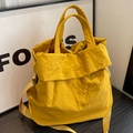 Große ingwergelbe Nylon-Eimertasche mit verstellbarem Riemen und Griffen für Damen - Gelb