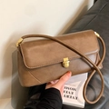 Minimalist brown faux leather underarm bag with gold clasp and slim shoulder strap - Tan