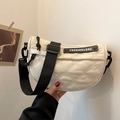 Beige quilted crescent crossbody bag with adjustable black strap and fashion label - Off White