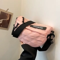 Chic pink quilted crossbody saddle bag with adjustable black strap for women - Pink