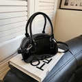 Glossy black bowling handbag in retro style with double handles for women - Black