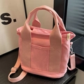 Rosafarbene Canvas-Einkaufstasche mit verstellbarem Gurt und geräumiger Tasche - Rosa