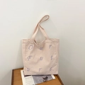 Borsa tote in velluto a coste beige con ricamo Our Future viola e consistenza morbida - Rosa