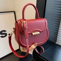 Retro dark red saddle bag in matte faux leather with a golden cylindrical metal buckle - Wine Red Style 1