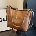 Sac seau vintage marron en cuir PU avec poche avant et logo doré pour le quotidien - Marron